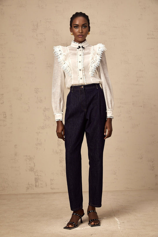 A white semisheer shirt with delicate lace trim details named Capucine