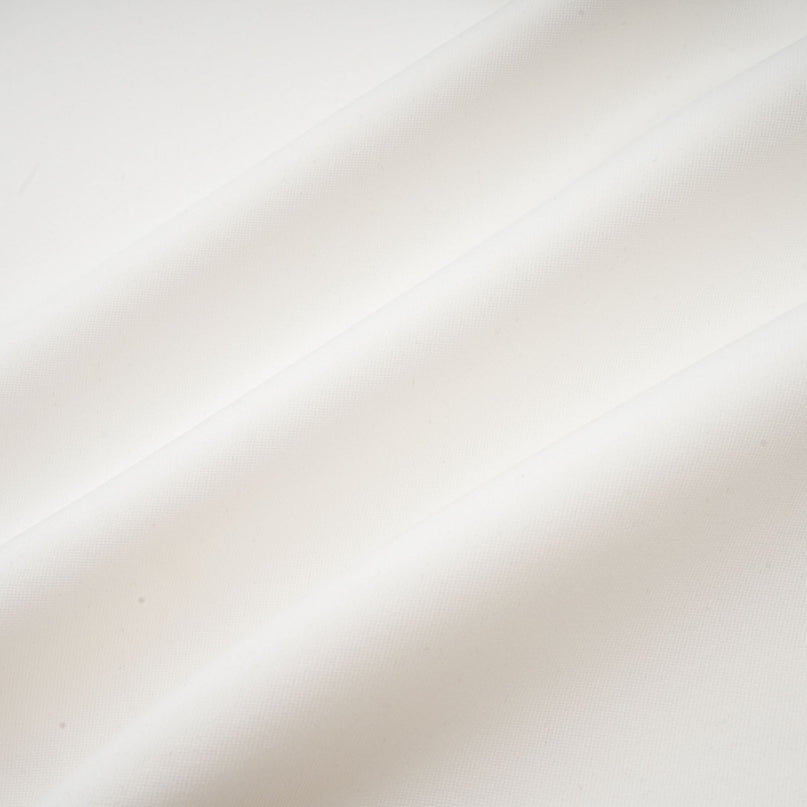 A white sleeveless maxi dress with a bow and artificial flower decoration named Magali