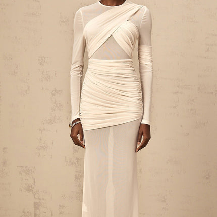 A white tulle maxi dress with ruched detailing named Veronique