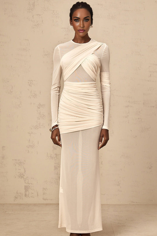 A white tulle maxi dress with ruched detailing named Veronique