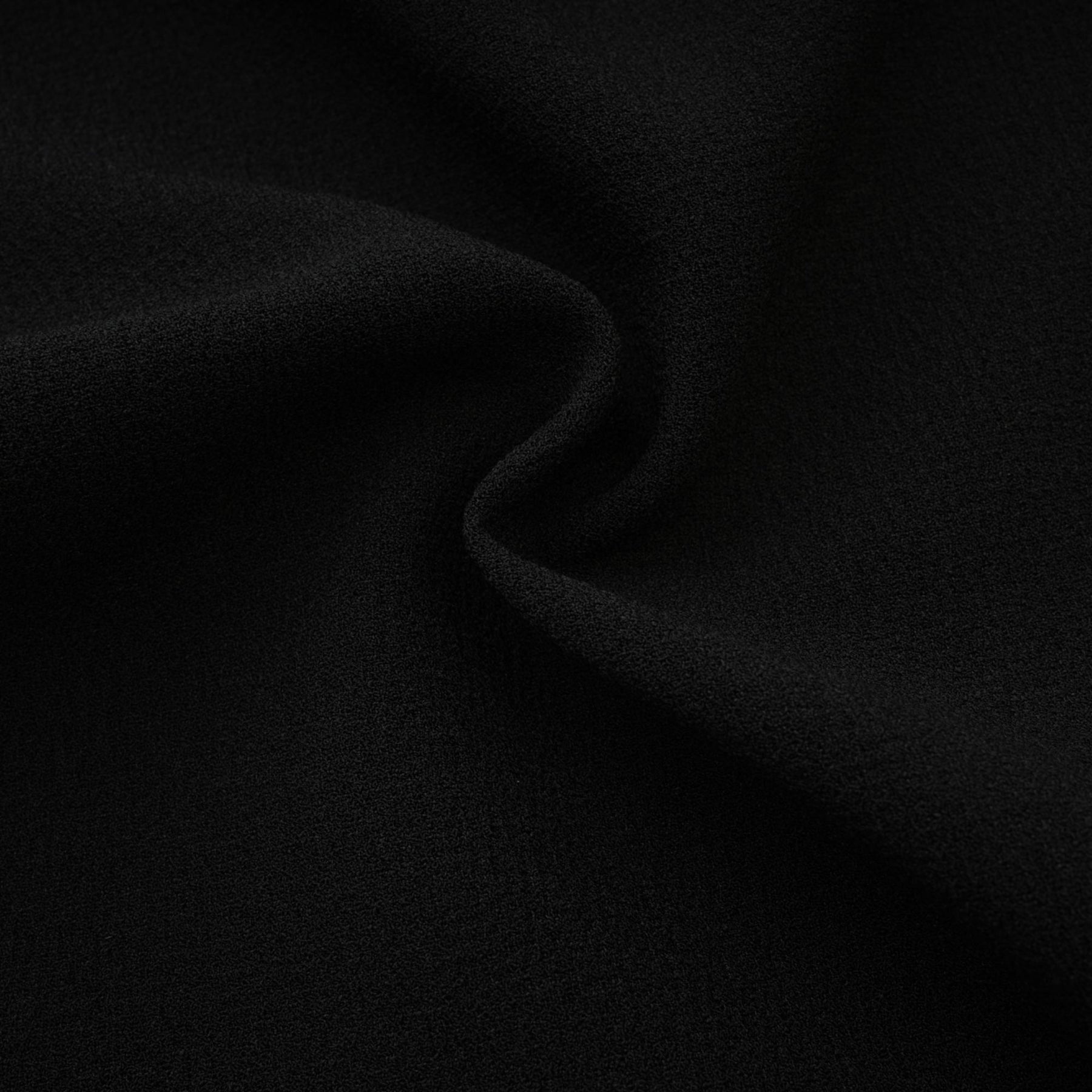 Black tweed dress with notched lapels long sleeves cinched waist front bowknot detailing and contrast colors
