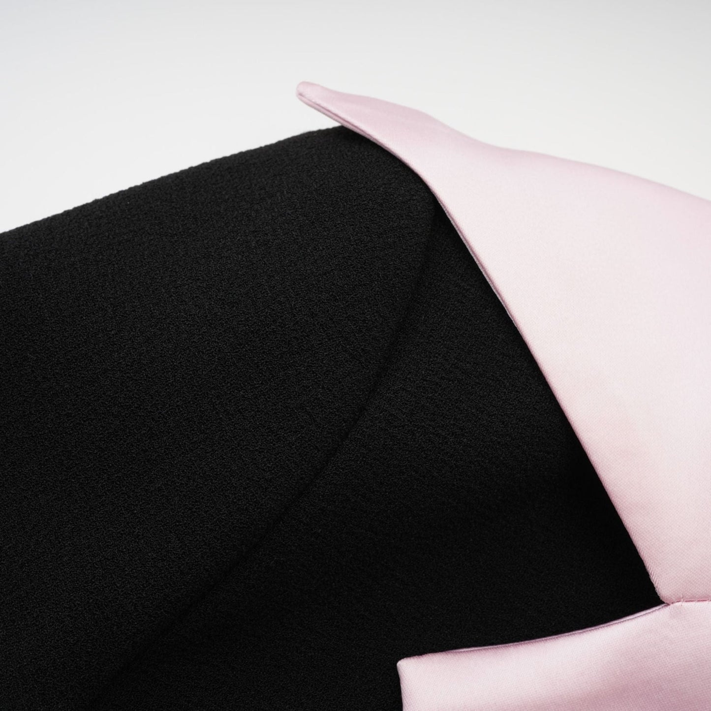 Black tweed dress with notched lapels cinched waist front bowknot and button fastening