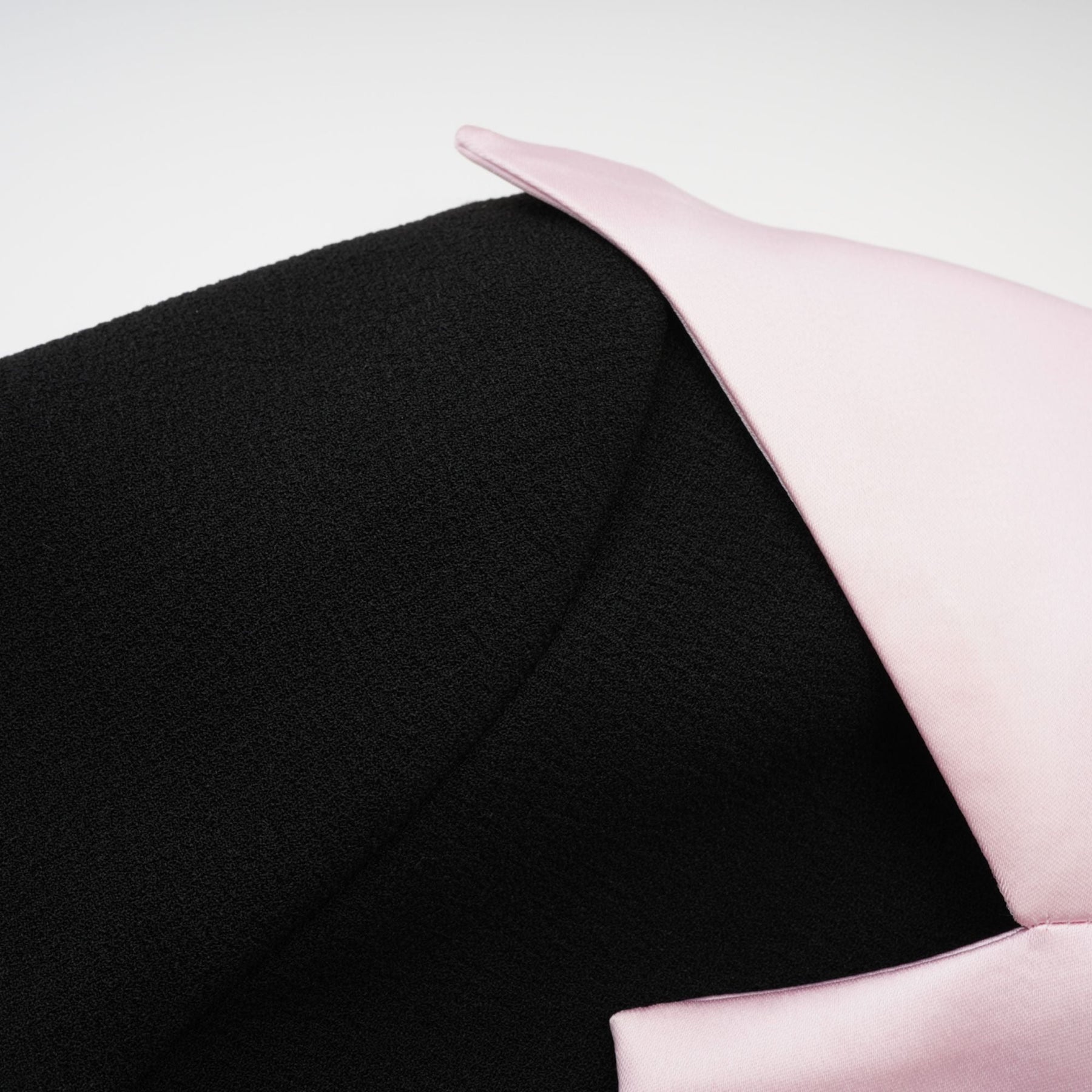 Black tweed dress with notched lapels cinched waist front bowknot and button fastening