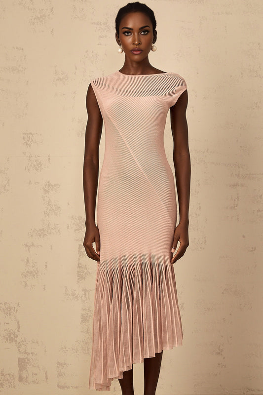 A woman wearing a dusty pink midi dress with a ribbed knit body and tulle panel details standing in a neutral pose