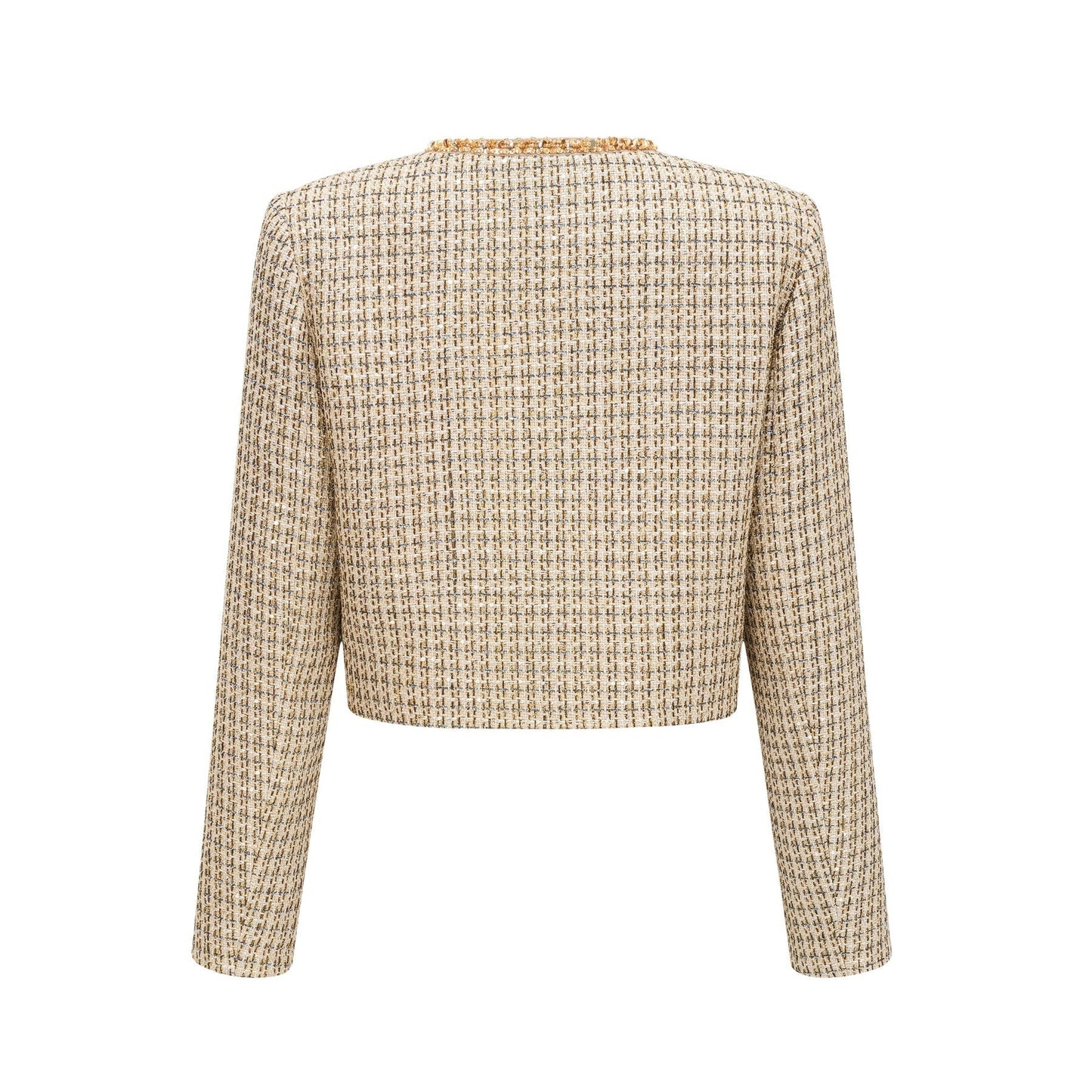 A woman wearing a gold tweed jacket and matching skirt set with sequin embellishments The outfit has a luxurious and sparkly appearance suitable for formal occasions