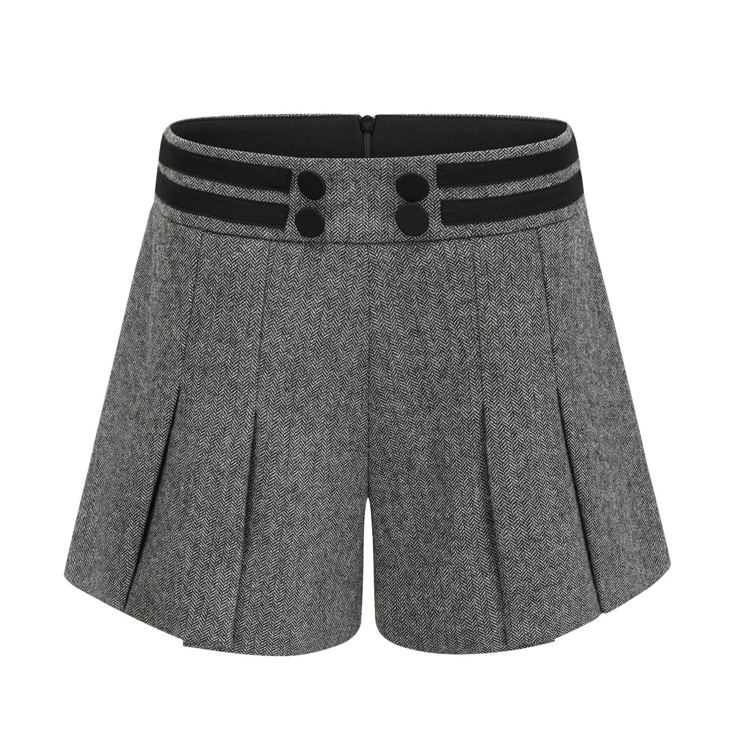 A woman wearing a grey herringbone pattern matching set consisting of a sleeveless top and shorts standing against a plain background