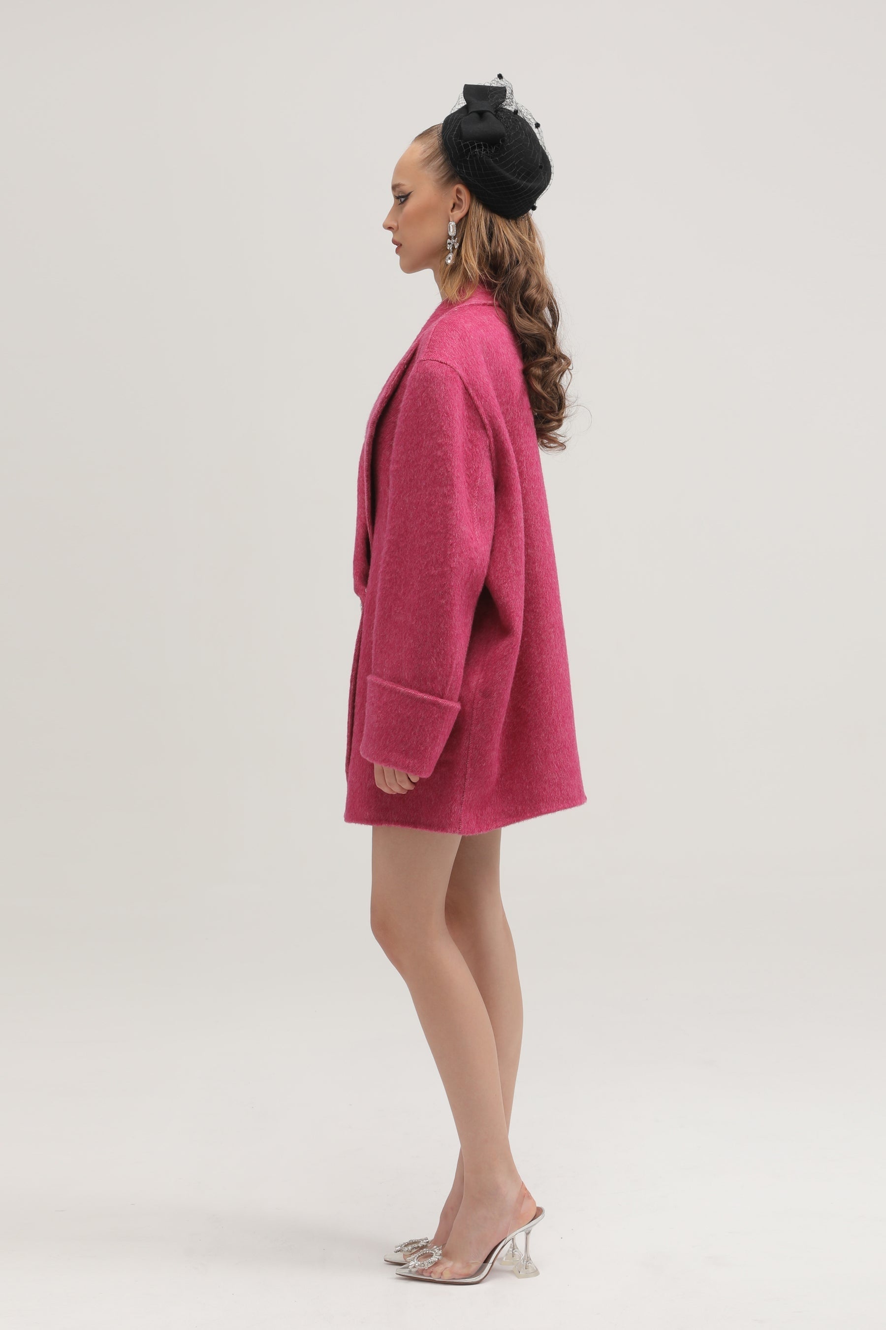 Grey herringbone dress with stud details notched lapels long sleeves and side pockets Central rear vent and front button closure Made of 45% Terylene 33% Cotton 21% Cellulose fiber 1% Spandex