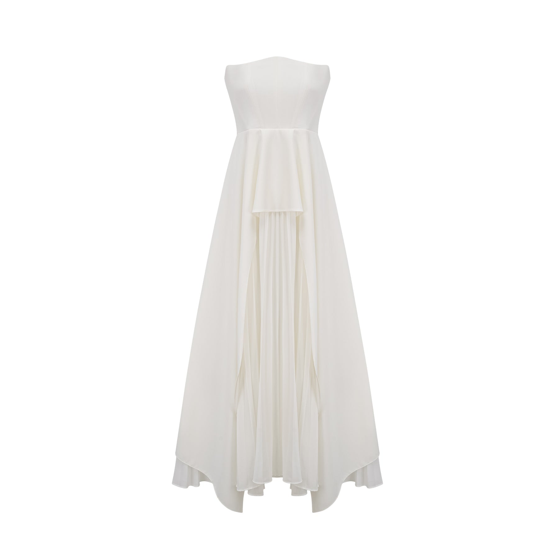 A woman wearing a long white pleated maxi dress with an offshoulder neckline