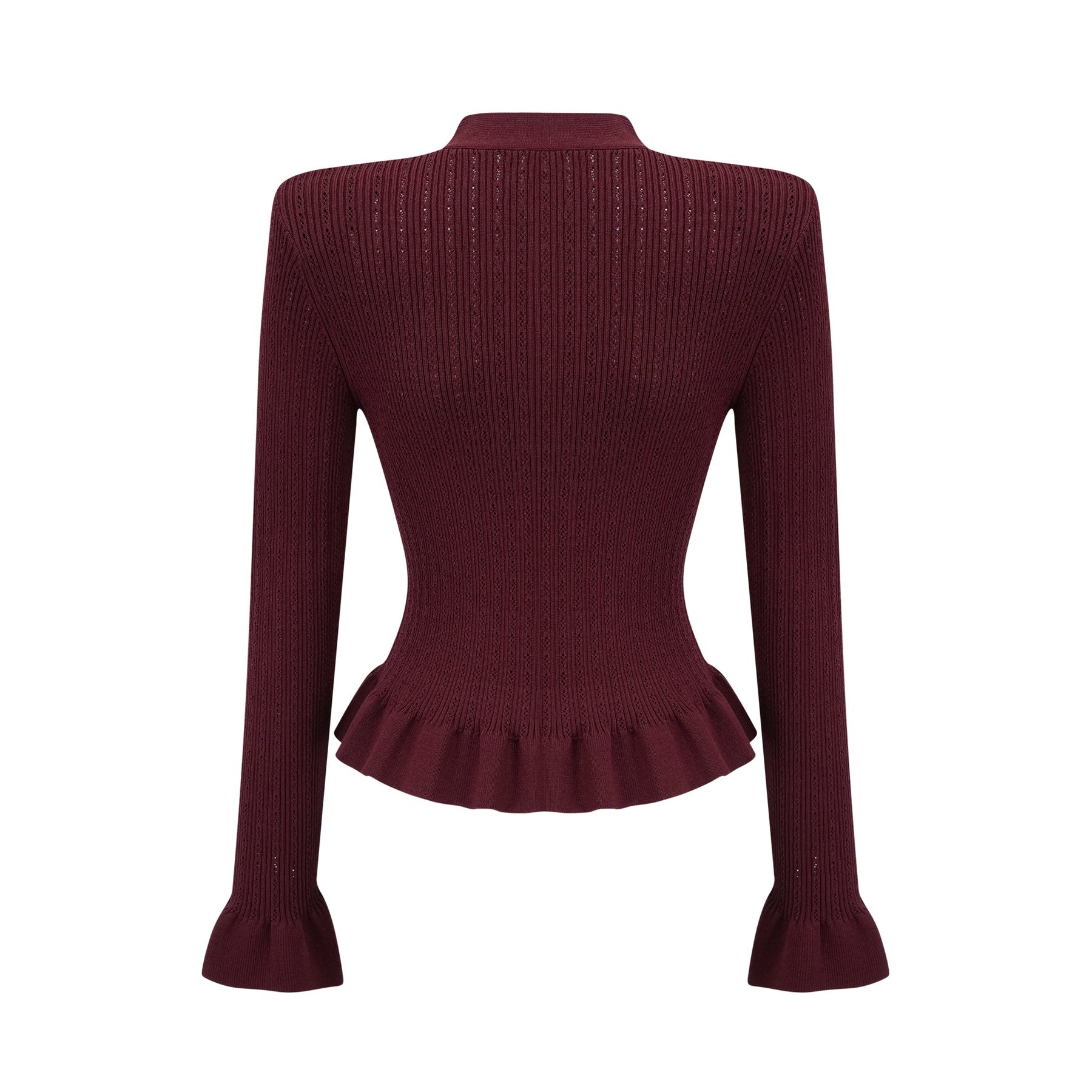 A woman wearing a matching red knit set consisting of a ruffled top and skirt The top features short sleeves and ruffled details while the skirt has a fitted silhouette Both pieces are in a vibrant red color