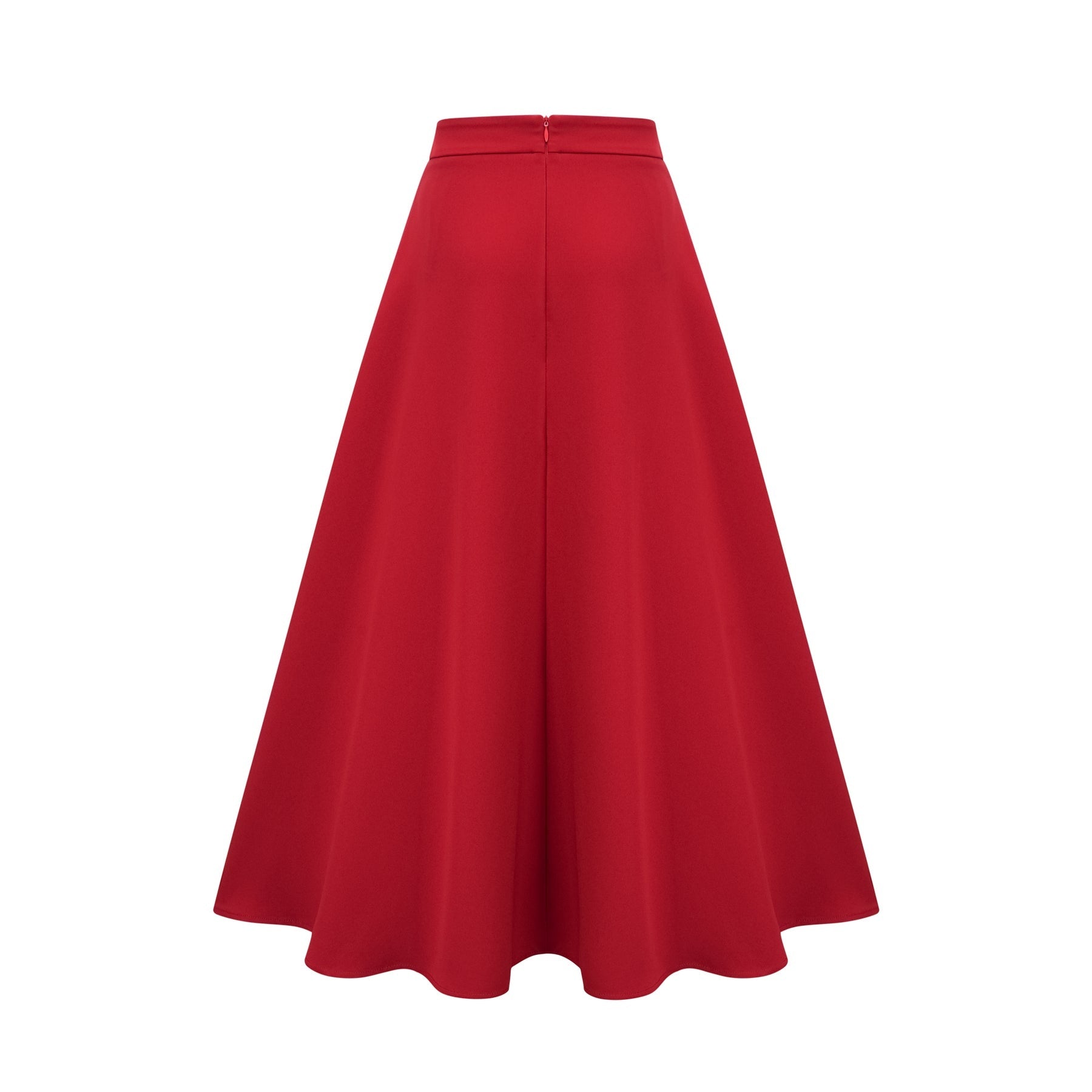A woman wearing a matching red outfit consisting of a pleated blouse and skirt The blouse has long sleeves and the skirt falls to mid calf length The fabric appears lightweight and flowy