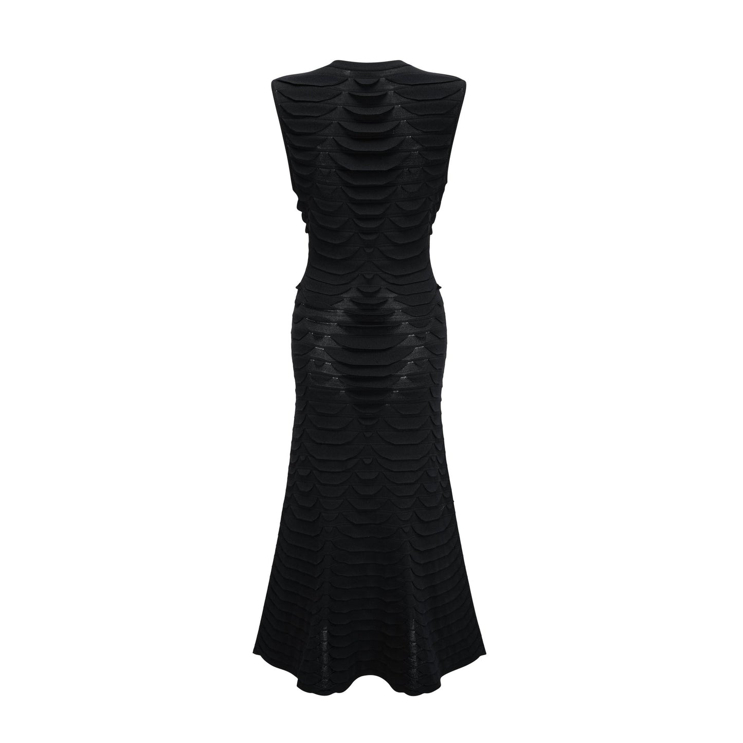 A woman wearing a midi length dress with a snake pattern design featuring godet inserts for added flare