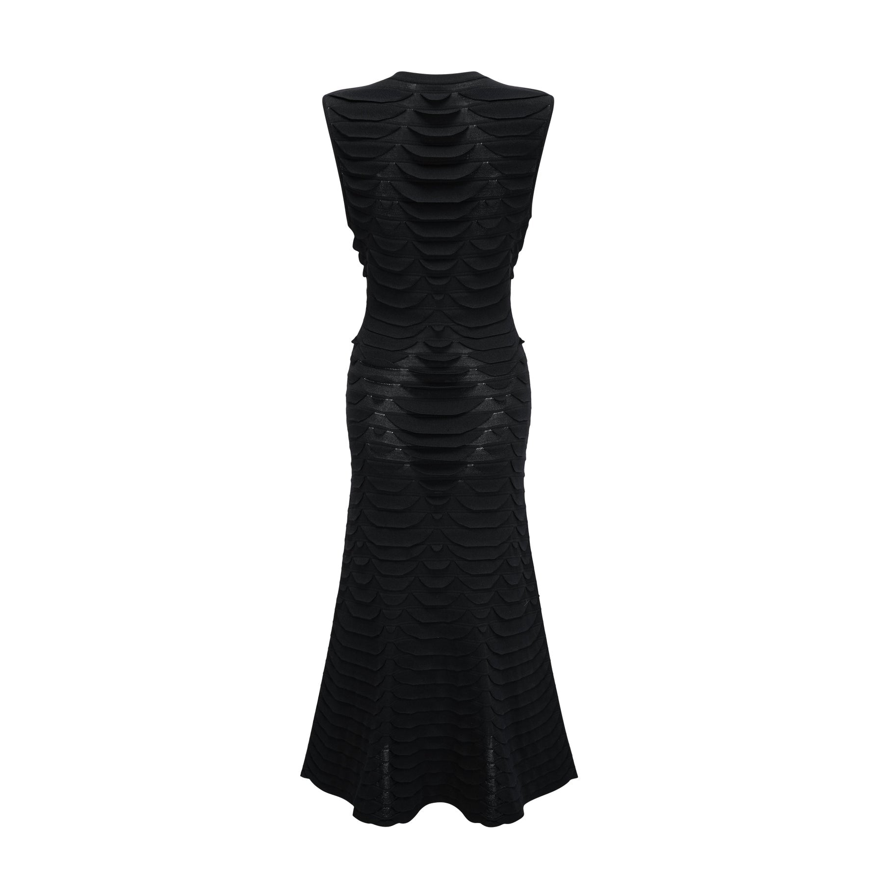 A woman wearing a midi length dress with a snake pattern design featuring godet inserts for added flare