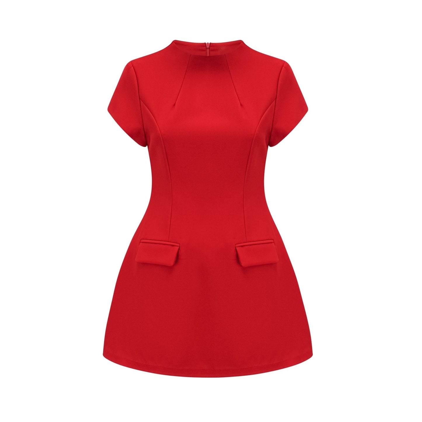 A woman wearing a vibrant red mini dress with cap sleeves standing against a plain background
