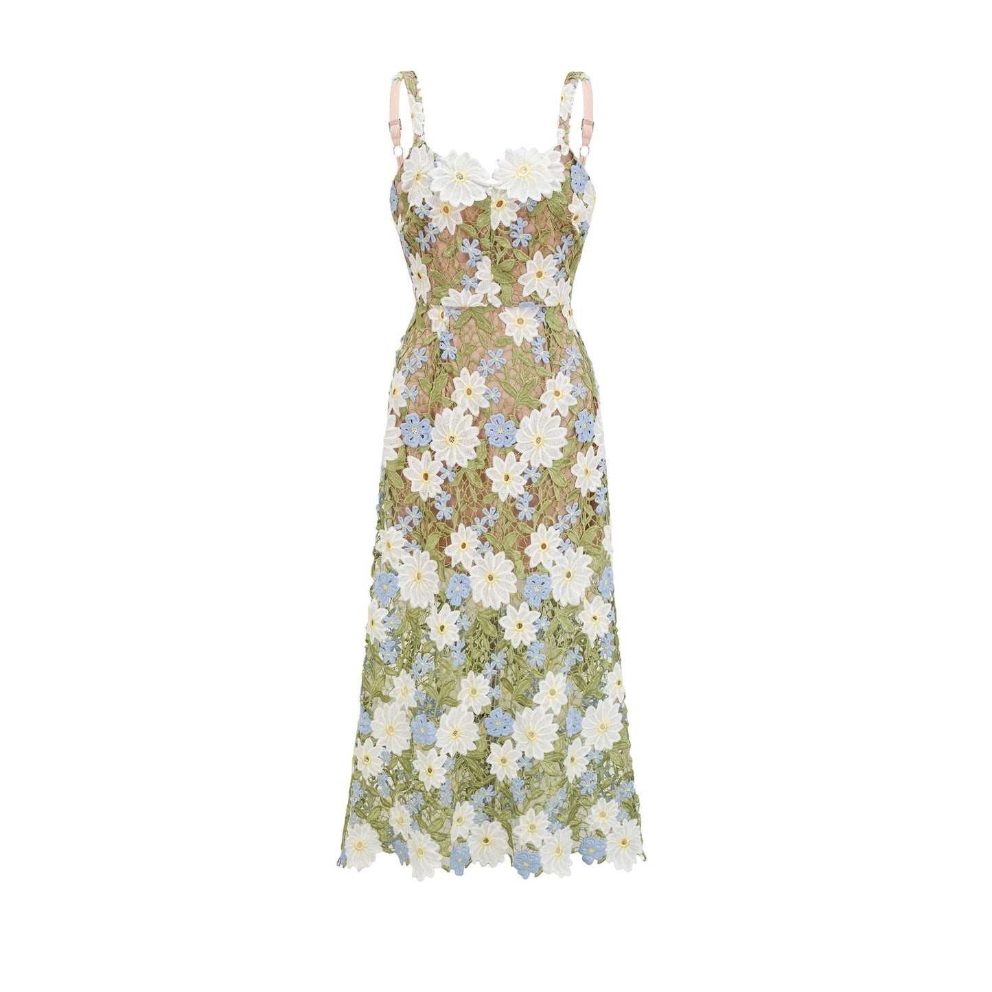 A woman wearing a white midi dress with floral embroidery and hollowcarved details standing in a relaxed pose