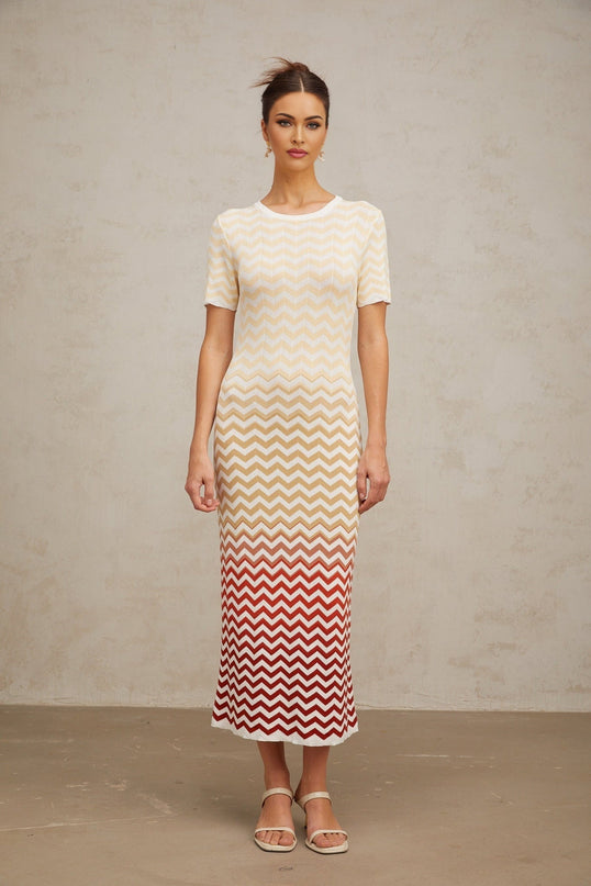 A yellow knit midi dress with a zigzag woven pattern named Isabelle