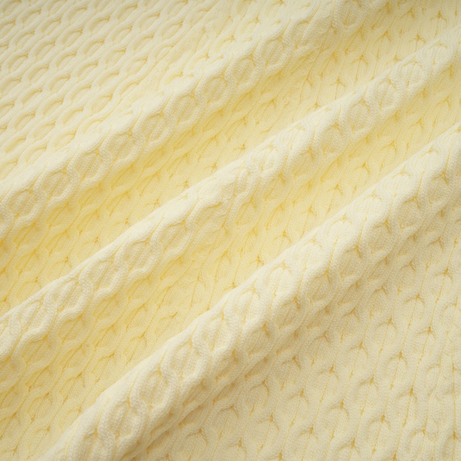 A yellow knitted dress with a sailor collar featuring a classic Madeleine style