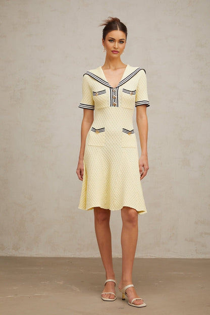 A yellow knitted dress with a sailor collar Madeleine style