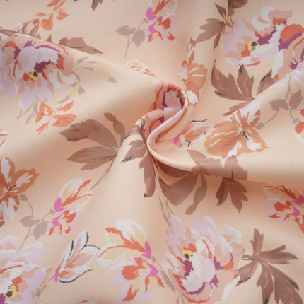 A yellow midi dress with a floral print pattern and button details