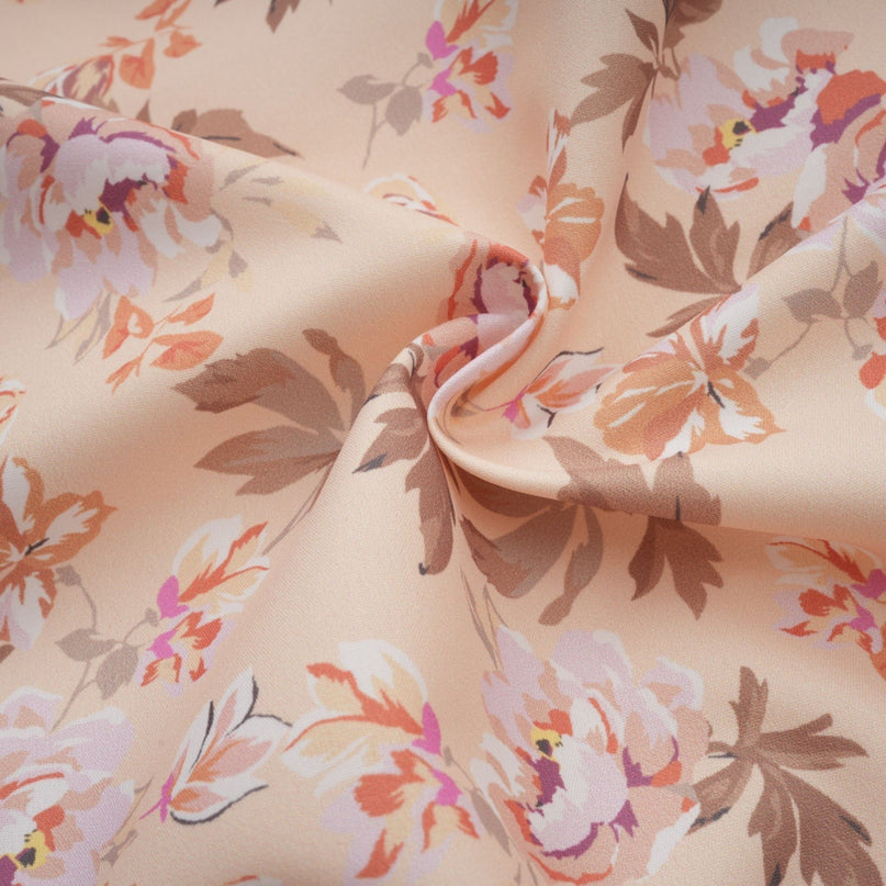 A yellow midi dress with a floral print pattern and button details