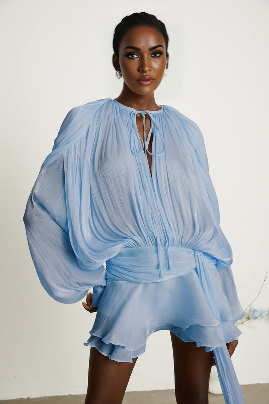 Adalgisa Blue Twist Mini Dress with Shoulder Pads Ruffled Hem Glitter Detailing Long Buttoned-Cuff Sleeves Neck Tie Fastening Draped Design Pleated Finish Rear Button Fastening Side Zip Closure