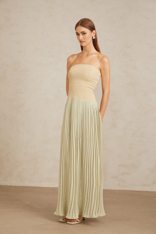 Adalgisa Maxi Dress in Green pleated corset off-shoulder silhouette built-in cups bra fitted waistline corset-style bodice exquisite pleated design rear zip fastening 100% Terylene fiber