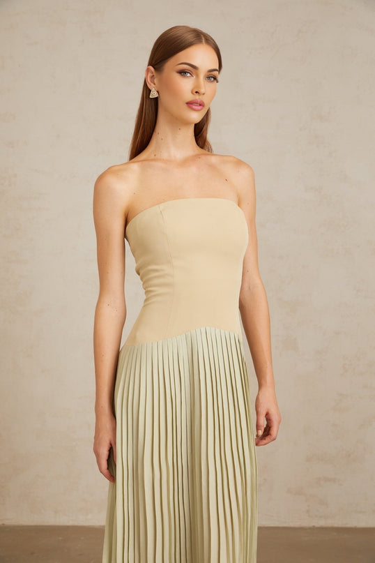Adalgisa Maxi Dress in Green pleated corset off-shoulder silhouette built-in cups bra fitted waistline corset-style bodice luxury pleated design rear zip fastening 100% Terylene fiber modern classic charm