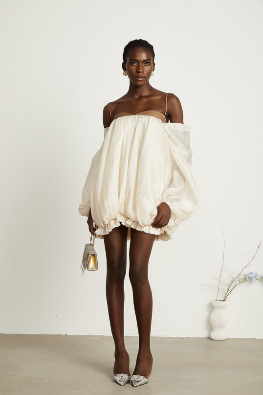 Adalgisa Mini Dress in Neutrals and Brown Tones Bell Sleeves Spaghetti Straps Pleated Design Ruffled Trim Puffy Hem Rear Button Fastening Viscose Elastane Blend Luxury Elegance Sophistication Timeless Style