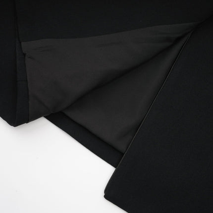 Aëlle Black Midi Coat with Statement Lapel Collar and Pleated Shoulders