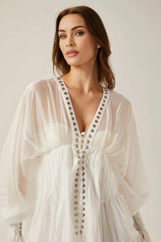 Agata White Mini Dress V-neck Cinched Waist Puff Sleeves Front Tie Fastening Rear Zip Closure Semi-sheer Elegant Allure Formal Events Upscale Gatherings Luxurious Fabrics