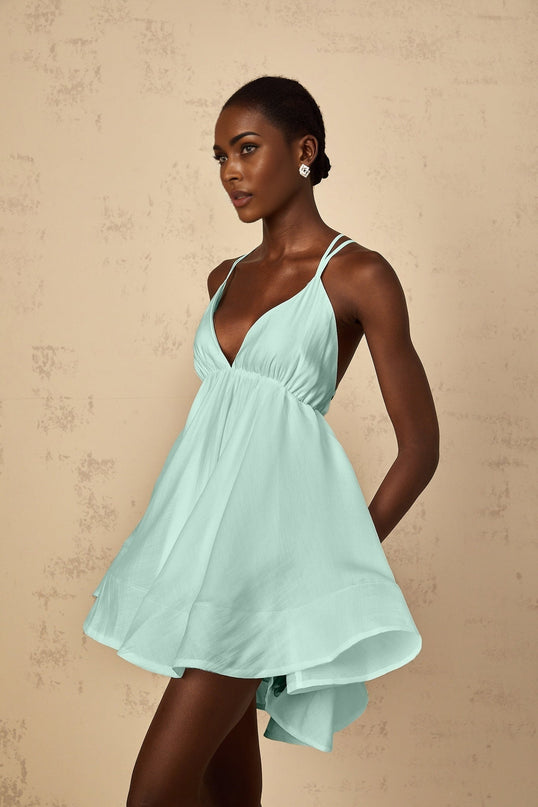 Agnese Green Mini Dress V-neck Sleeveless Tencel Terylene Fiber Shirred Asymmetrical Flounce Self-tie Cross-over Straps Thigh-length High-low Silhouette Chic Fashion Statement