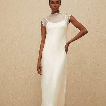 Agnese White Maxi Dress with Sheer Shoulders and Flared Hem