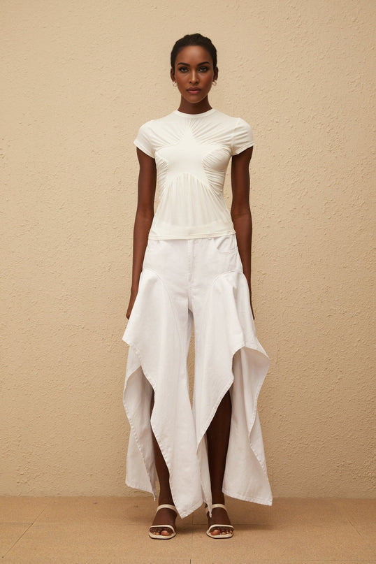 Aino's White Asymmetrical Denim Jeans premium denim chic asymmetrical design ruffled detailing wide legs long length five pockets belt loops front button zip fastening timeless essential sophistication Model 1.77m size M Composition 100% Cotton