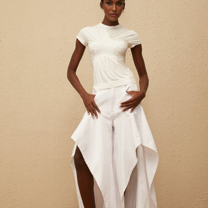Aino's White Asymmetrical Denim Jeans premium denim chic asymmetrical design ruffled detailing wide legs long length five pockets belt loops front button zip fastening timeless essential sophistication 100% Cotton