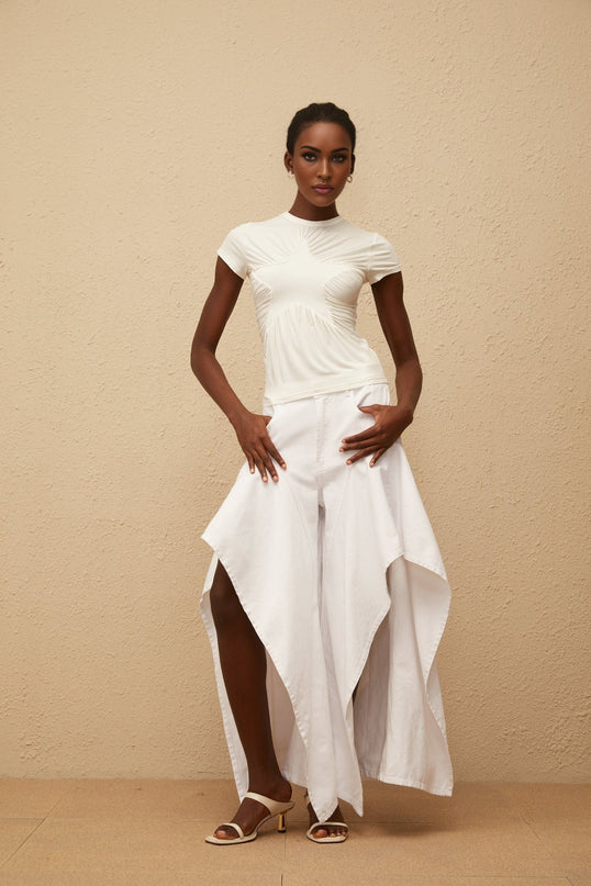 Aino's White Asymmetrical Denim Jeans premium denim chic asymmetrical design ruffled detailing wide legs long length five pockets belt loops front button zip fastening timeless essential sophistication 100% Cotton