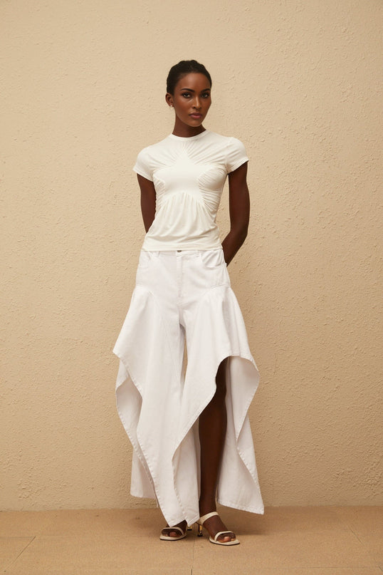 Aino's White Asymmetrical Denim Jeans luxury ruffled wide legs long length five pockets belt loops button zip fastening 100 percent cotton