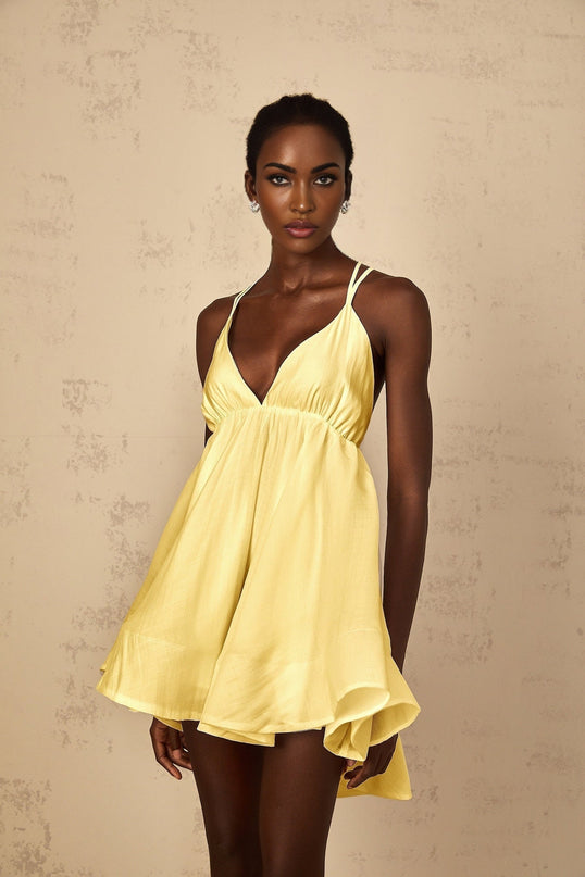 Alba Mini Dress in Yellow Sleeveless V-Neck Shirred Asymmetrical Flounce Hem