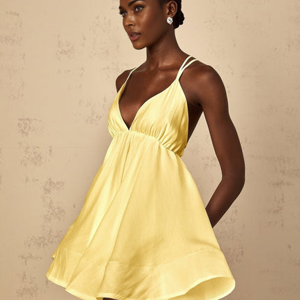 Alba Mini Dress in Radiant Yellow V-Neck Sleeveless Self-Tie Cross-Over Straps Shirred Effect Asymmetrical Flounce Hem Thigh-Length Slip-On Style Luxurious Blend High-Low Silhouette