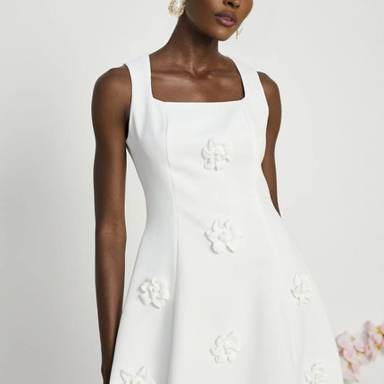 Alessandra White Mini Dress with Faux-Flower Embellishment Square Neck and Flared Skirt Rear Zip Fastening Thigh-Length 79% Polyester 21% Elastane