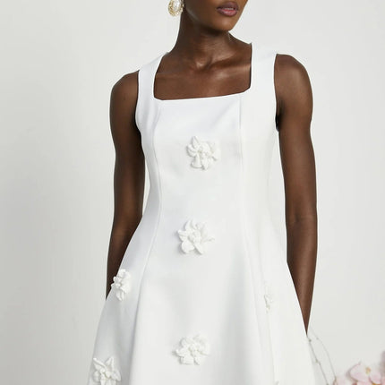 Alessandra White Mini Dress with Faux-Flower Embellishment Square Neck and Flared Skirt Rear Zip Fastening Thigh-Length 79% Polyester 21% Elastane