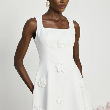 Alessandra White Mini Dress with Faux-Flower Embellishment Square Neck and Flared Skirt Rear Zip Fastening Thigh-Length 79% Polyester 21% Elastane