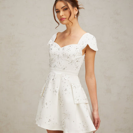 Alessandrina White Mini Dress Sweetheart Neck Cap Sleeves Bustier Style Rhinestone Embellishment Flounce Hem Rear Zip Fastening Thigh Length Terylene Fabric