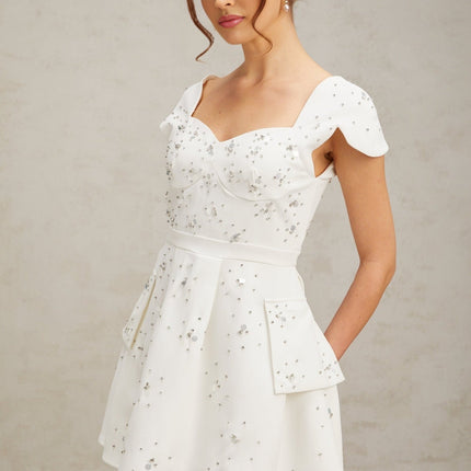 Alessandrina White Mini Dress Sweetheart Neck Cap Sleeves Bustier Style Rhinestone Embellishment Flounce Hem Rear Zip Fastening Thigh Length 100% Terylene