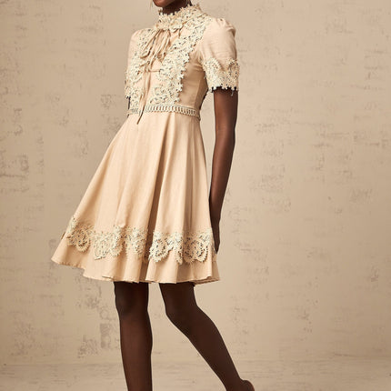 Alexandra Mini Dress in Neutrals corded lace mock neck flared skirt linen blend elegance sophistication femininity chic refinement
