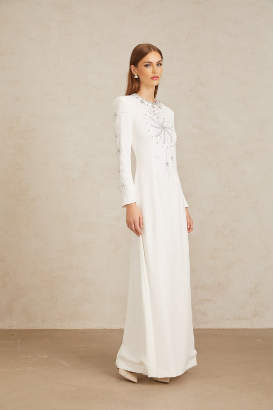 Aloïse White Embellished Maxi Gown crystal and rhinestone embellishments round neck long sleeves fitted waistline flared hem rear zip fastening 75% cotton 25% Terylene fiber