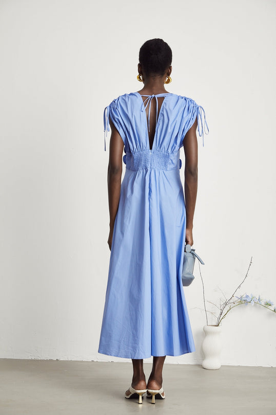 Alt text Blue maxi dress named Emma with petal detail and drawstring waist
