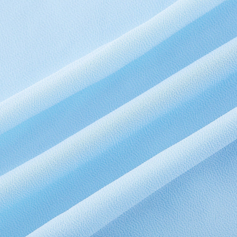 Alt text Blue maxi dress named Juno with cutouts and ruffles