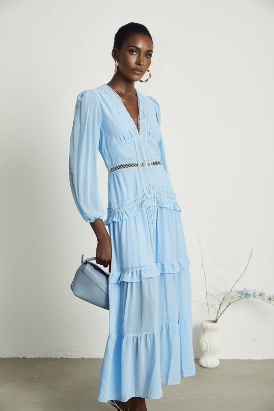 Alt text Blue maxi dress with cutouts and ruffles named Juno
