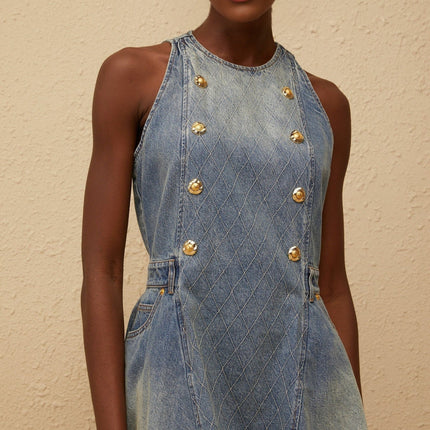 Alyssa Mini Dress in Captivating Blue Faded Denim Sleeveless Belt Loops Embossed Gold-Tone Buttons Puff Skirt Side Slit Pockets Rear Zip Fastening Thigh-Length 100% Cotton