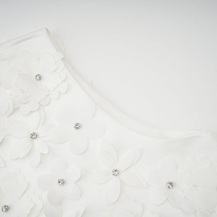 Alyssa Mini Dress in White Crystal Embellished Thigh-Length Hem Faux-Flower Design Straight Hem Rear Zip Fastening 70% Terylene 30% Cotton Sleeveless Round Neck Size M Model 5'10"