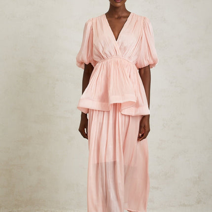 Amalia Maxi Dress in Pink pleated ruffles glossy finish V-neck short puff sleeves chic peplum waist sophisticated silhouette pleated ruffled ruched detailing elegant rear button fastening graceful maxi length 100% Terylene fiber luxurious craftsmanship timeless style